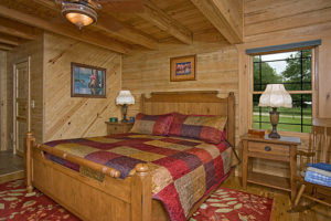 Weston Cypress Log Home Cabin Master Bedroom
